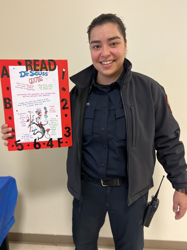 Officer Anton prepares to read to students!